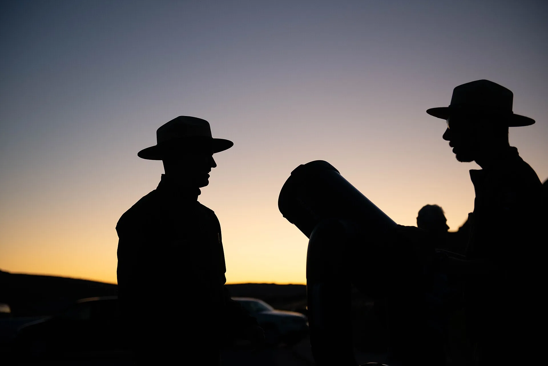 silhouettes of two rangers with a telescope Rangers set up telescopes for a star party celebrating the park's certification as an international dark sky park. Keywords: night sky; night skies; dark sky; dark skies; stargazing; telescope; staff; rangers. What separates strong dark sky trip case studies cost from average is the measure, applied