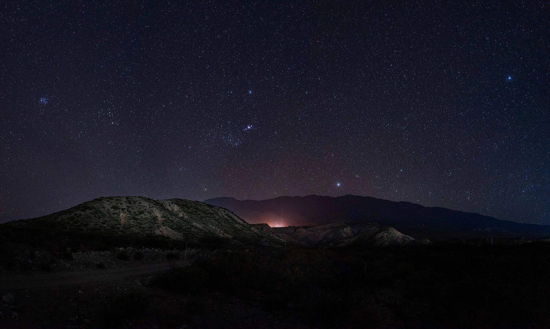 With the camera lens facing east, the panoramic view of this light pollution-free sky reveals an almost perfect firmament between the Pleiades to Canopus, Orion rising in the middle and Sirius looming behind the southernmost mountain. It is the crown of the small point of light that comes from a tow. How to Use a Light Pollution Map to Find Dark Skies in the US