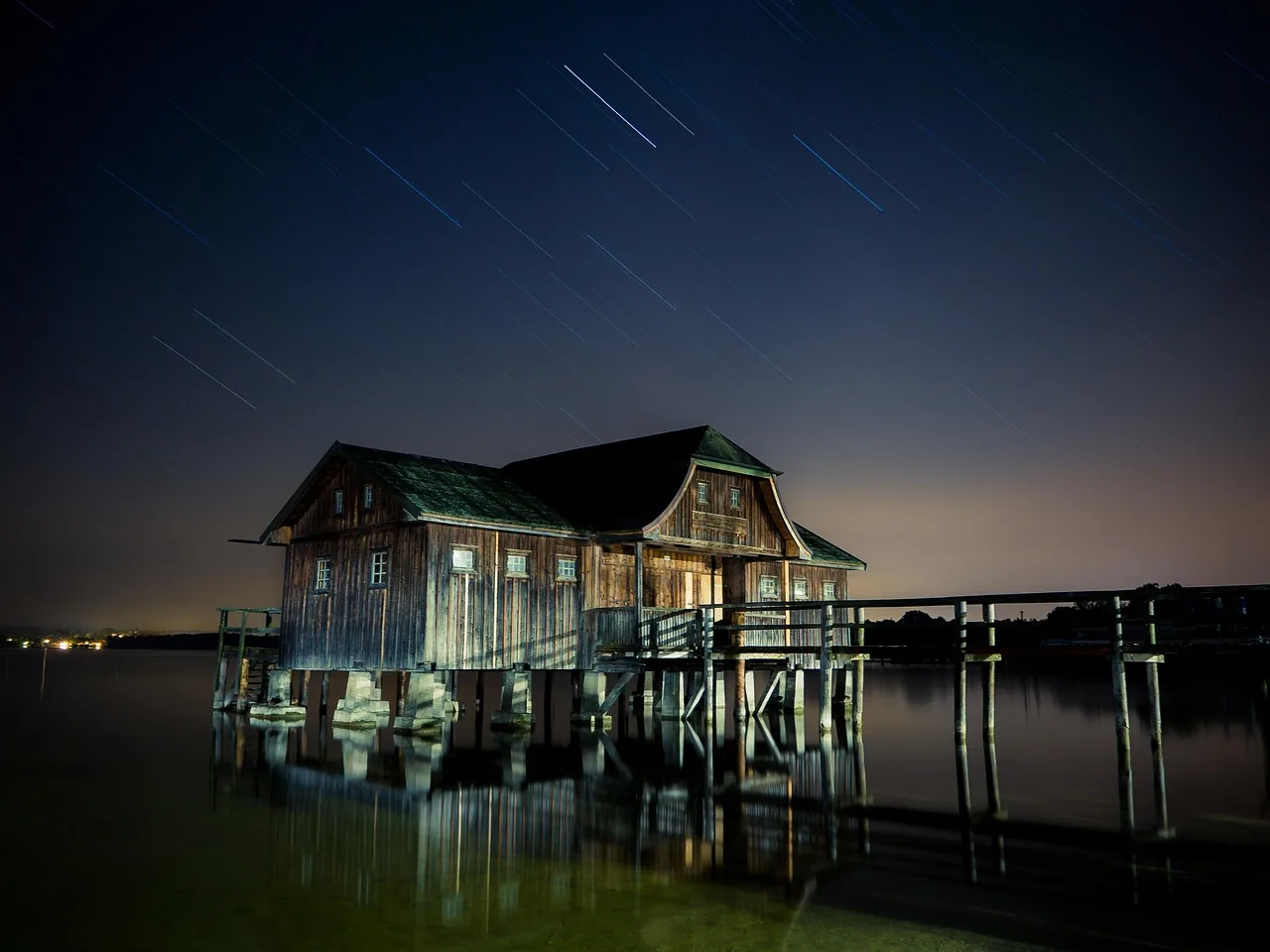 stilt house, stars, star trails, starry night, night photography, starry sky, hut, cabin, cottage, wooden house, night, house, mirroring, seascape, old, house on stilts, waters, log cabin, boat house, reflection, water reflection, cabin, house, house, house, house, house. Why does reading the answers matter so much for dark sky lodging booking?, set against reading the answers