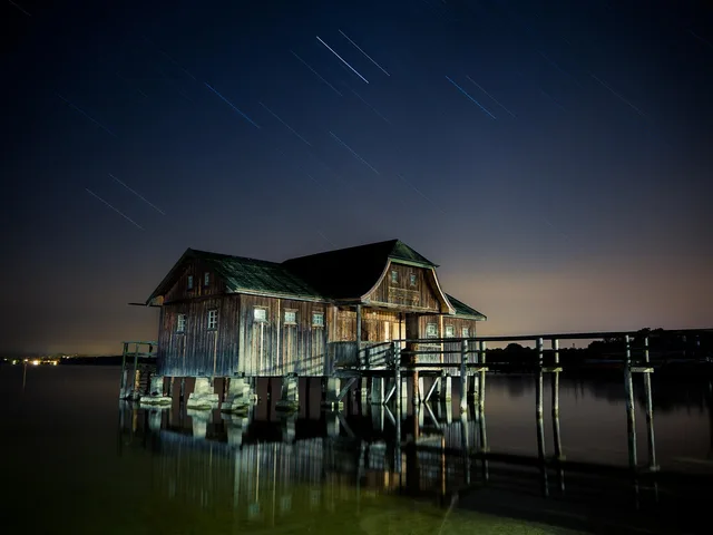 stilt house, stars, star trails, starry night, night photography, starry sky, hut, cabin, cottage, wooden house, night, house, mirroring, seascape, old, house on stilts, waters, log cabin, boat house, reflection, water reflection, cabin, house, house, house, house, house. Why does reading the answers matter so much for dark sky lodging booking?, set against reading the answers
