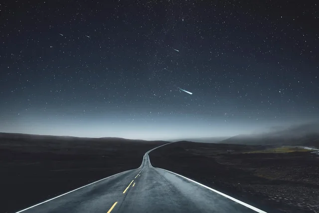 highway, night, landscape, sky, nature, stars, shooting star, night sky, asteroid, mountains, fog, darkness. Where to stargaze near Denver, from Rocky Mountain to Great Sand Dunes